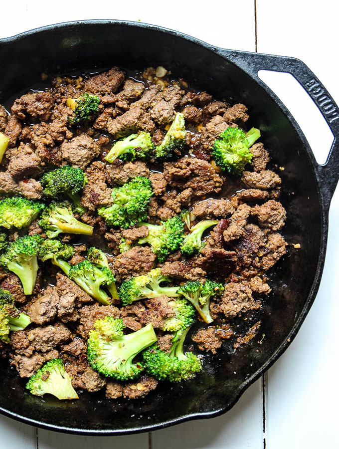 Easy 30 minute korean beef and broccoli is made quickly in a cast iron pan.
