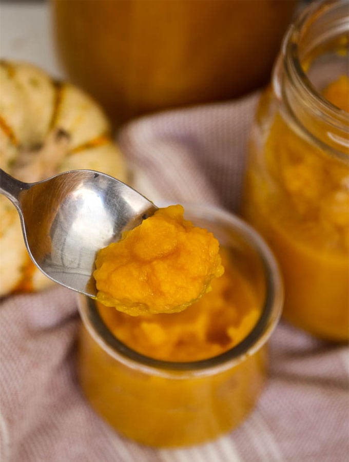 Pumpkin puree is made easily with roasted sugar pie pumpkins and preserved in glass jars. The texture of home made pumpkin puree is more watery and smooth than normal canned pumpkin puree.