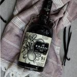 Vanilla extract is made easily by slicing the vanilla beans in half and placing htem in Kraken Black Spiced Rum to begin the extraction.