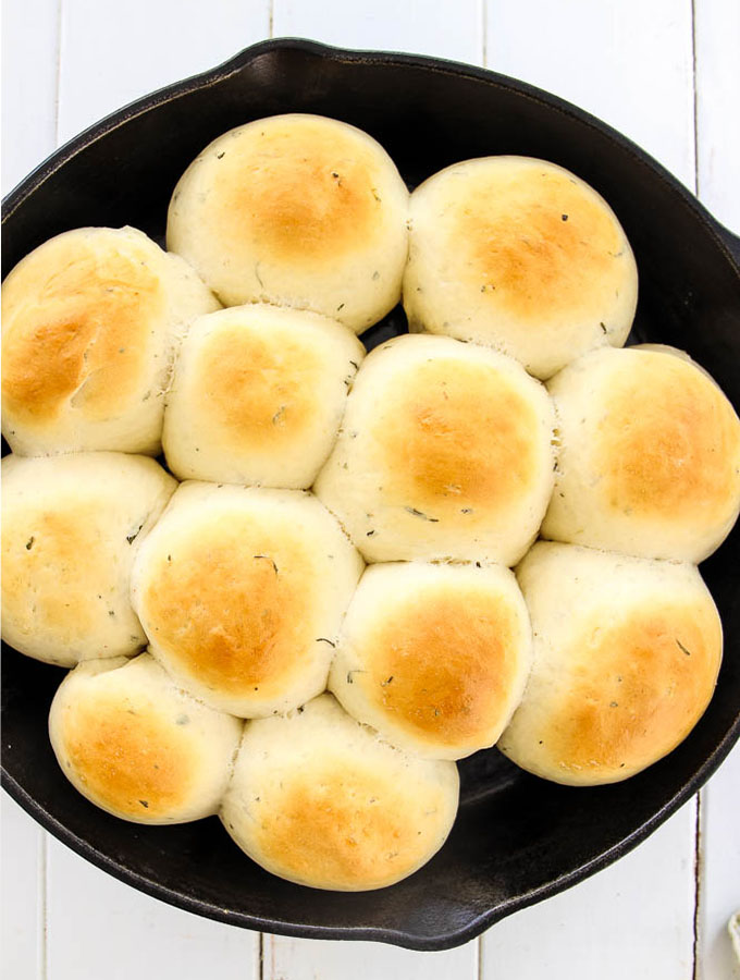Rosemary Garlic Dinner Rolls are fresh out of the oven with perfectly browned tops.