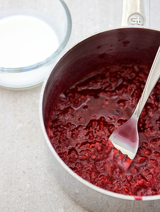 Raspberry sauce is made in one pan and thickened with a cornstarch slurry.