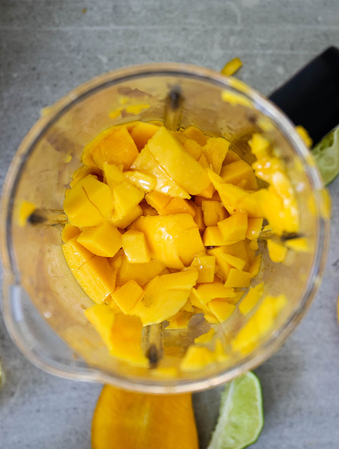 All the mango tajin ingredients are combined in a blender.
