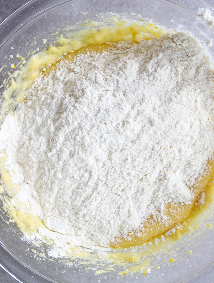 The dry ingredients are incorporated into the wet ingredients to make Orange Pistachio Biscottis.