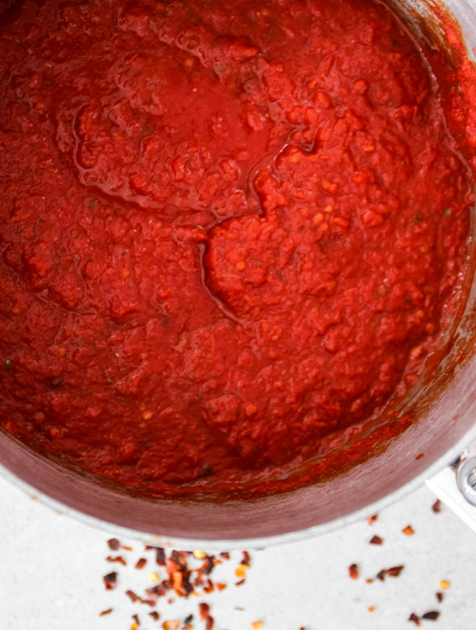 Easy Five Minute Marinara Sauce is simmered quickly in a saucepan.