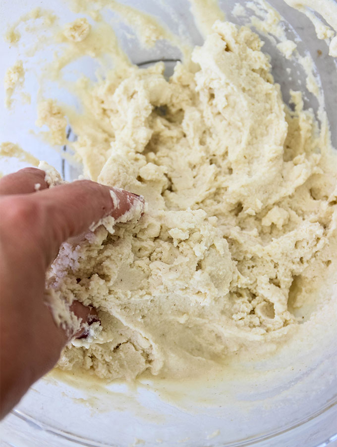 mixing dough in a bowl