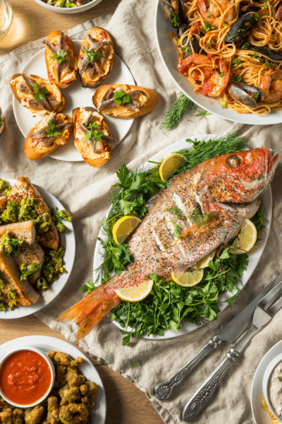 Feast of the Seven Fishes is an Italian tradition that includes 7 dishes of seafood on Christmas Eve.