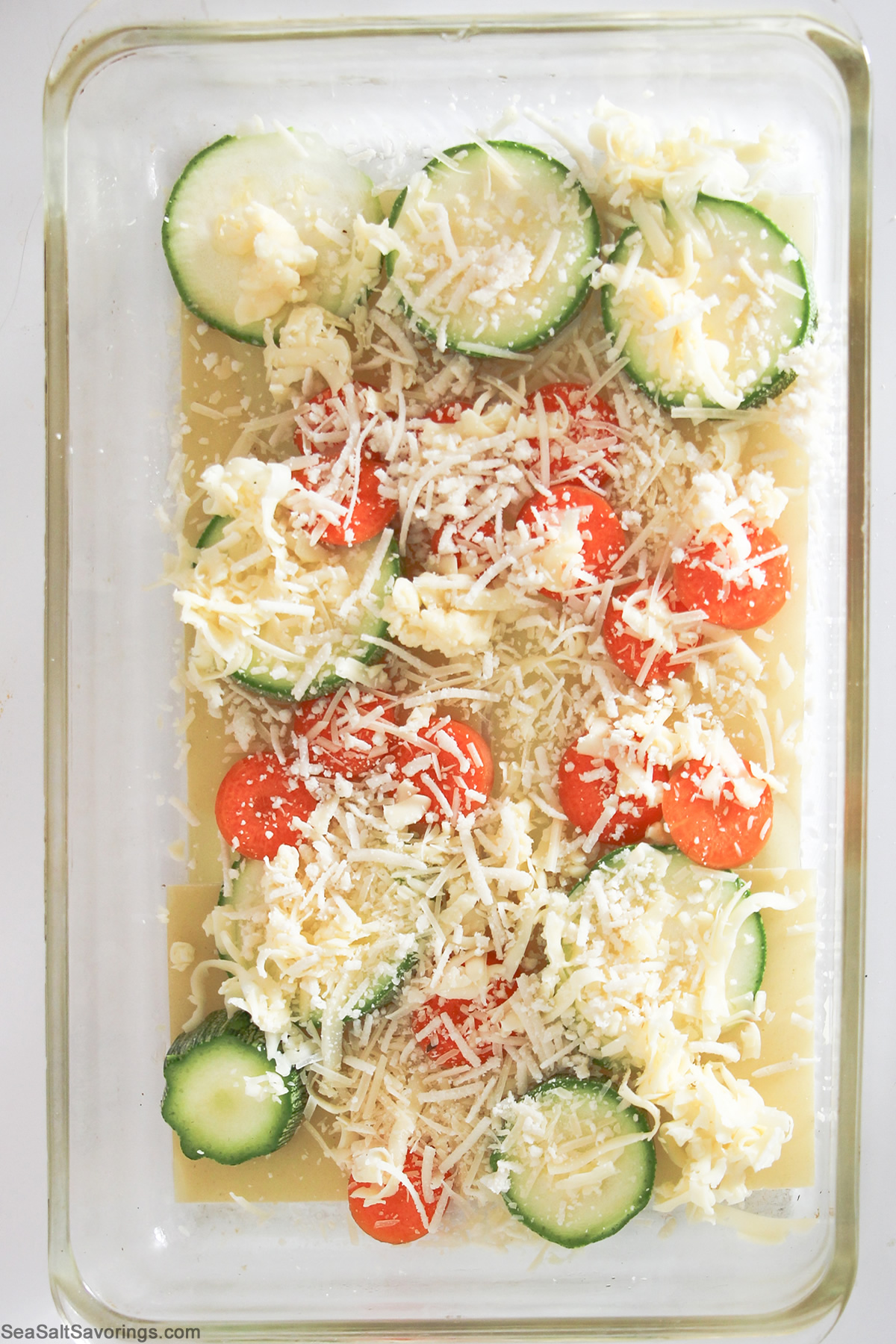 second layer is vegetables and cheese