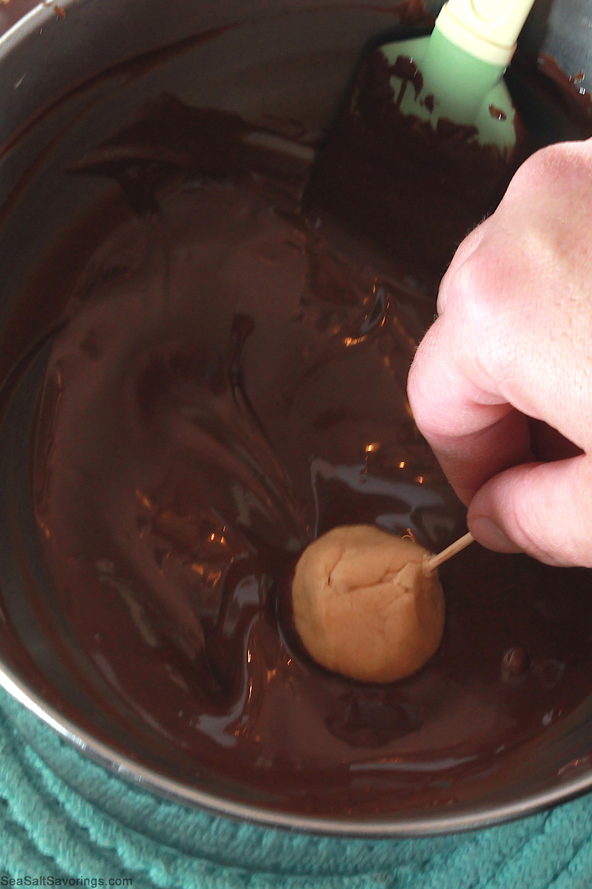 dipping balls in melted chocolate