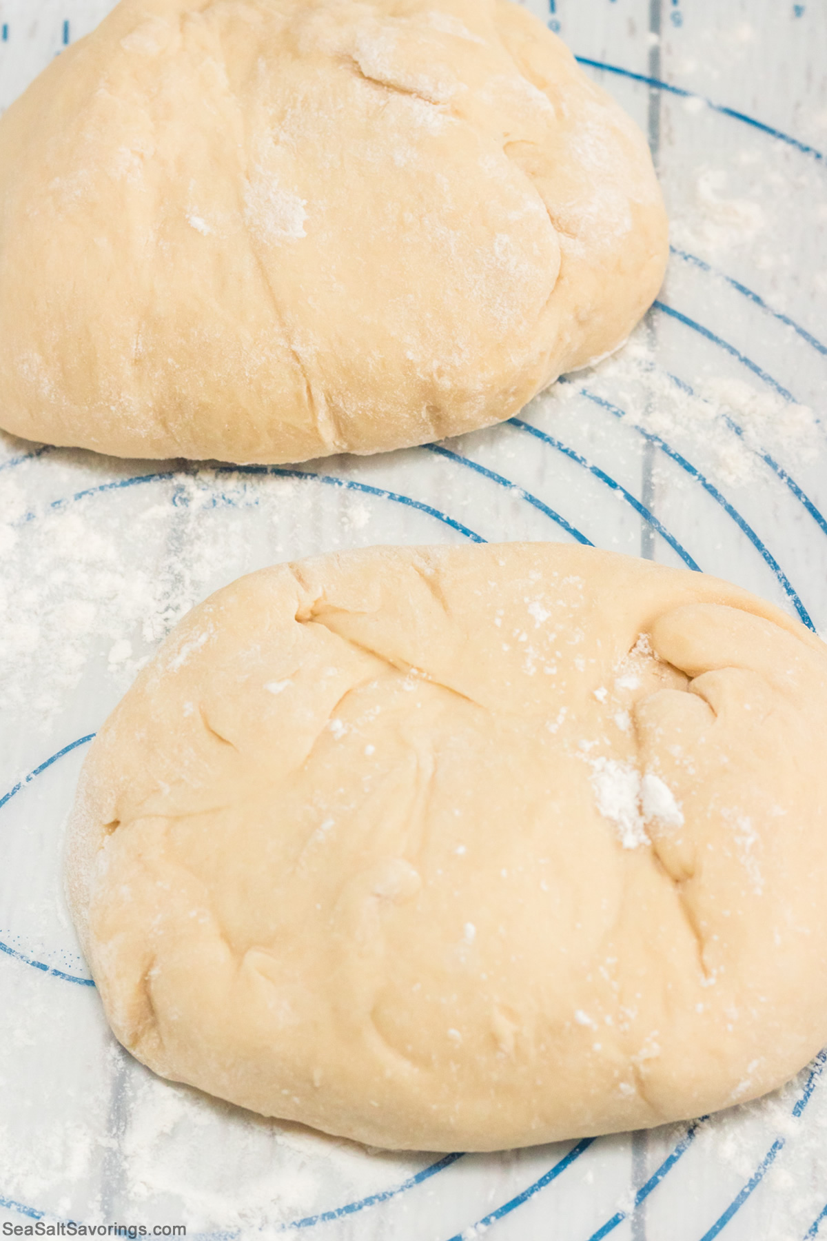 dough balls resting on a table