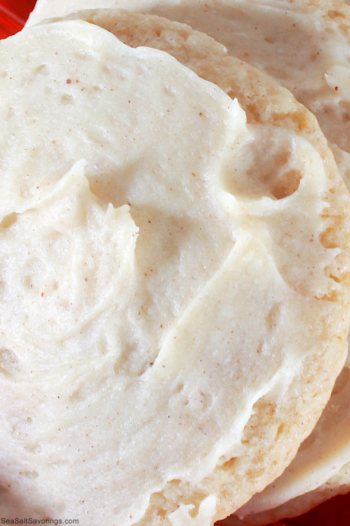 close up view of an eggnog cookie showcasing the textures