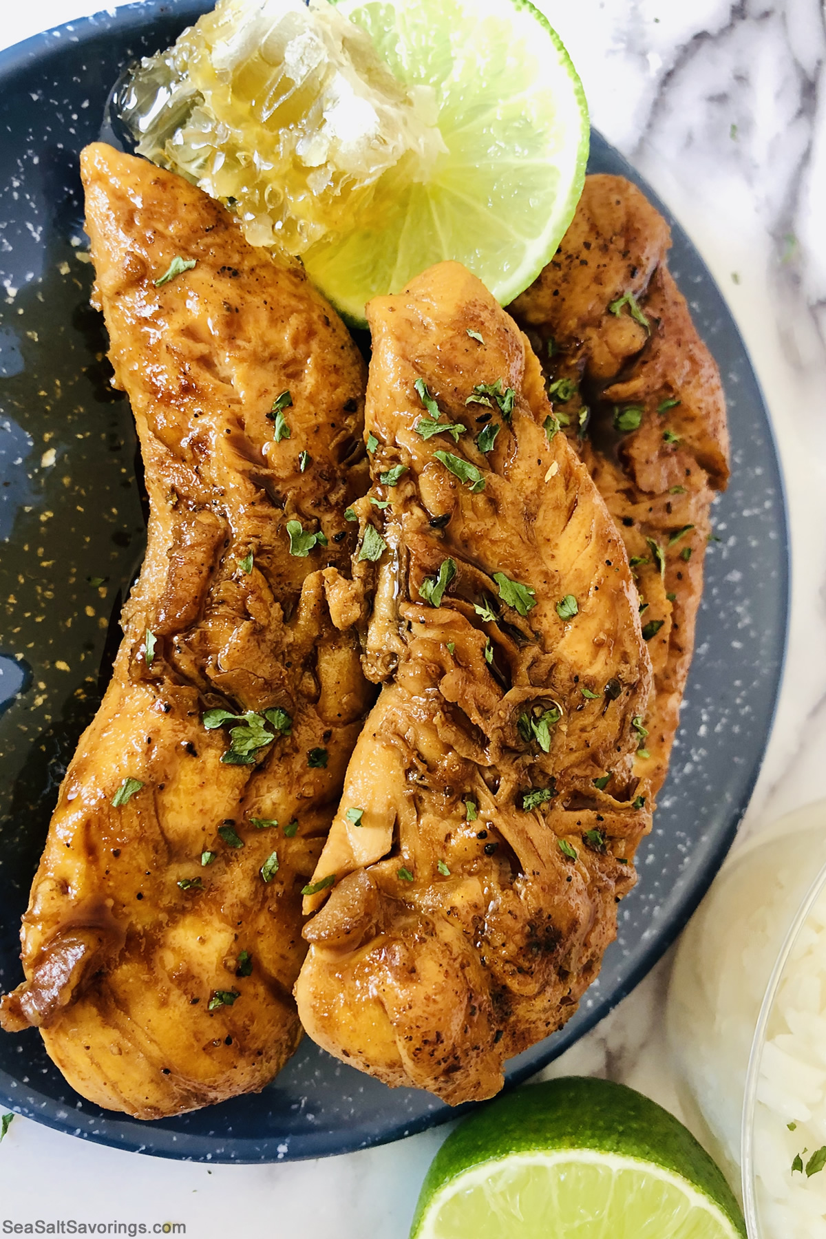 honey rum chicken breasts on a plate