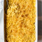 Baked Mac and Cheese is baked in a white baking dish.