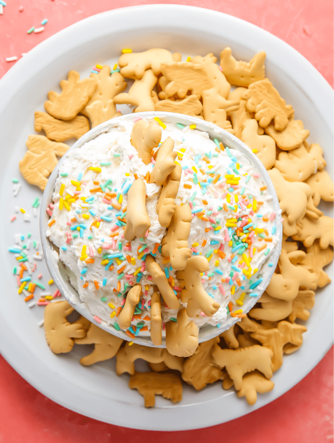 Animal crackers are placed on top of the dip to make for easy dunking.