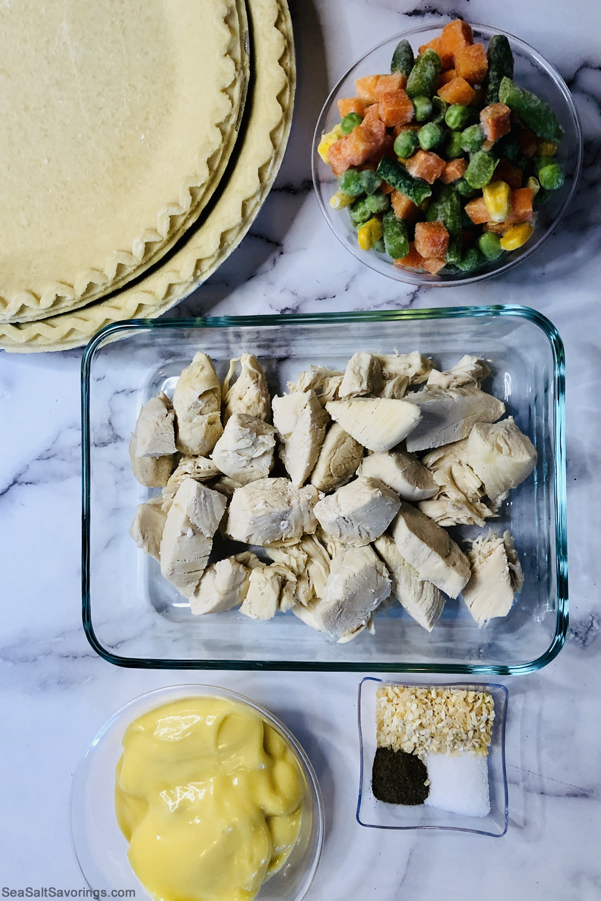 ingredients for chicken pot pie on a table