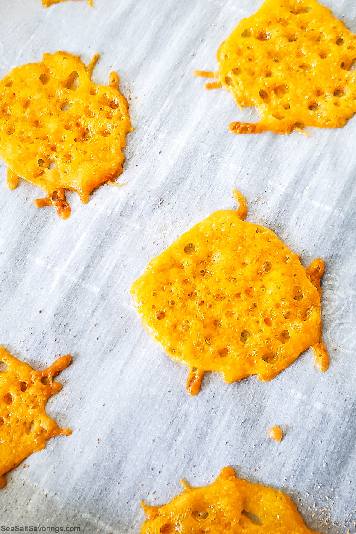 cheese chip baking on baking sheet