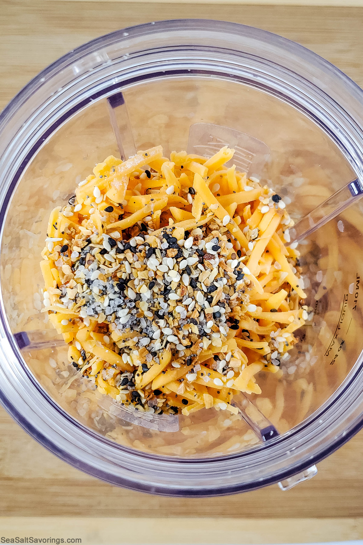 mixing bowl with cheese and seeds