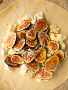 Honey and lavender are drizzled over the fig and brie.