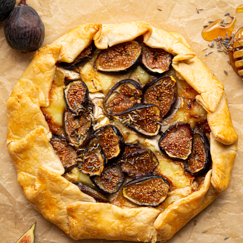 The fig and brie galette is baked until the crust is golden brown, then drizzled with honey.