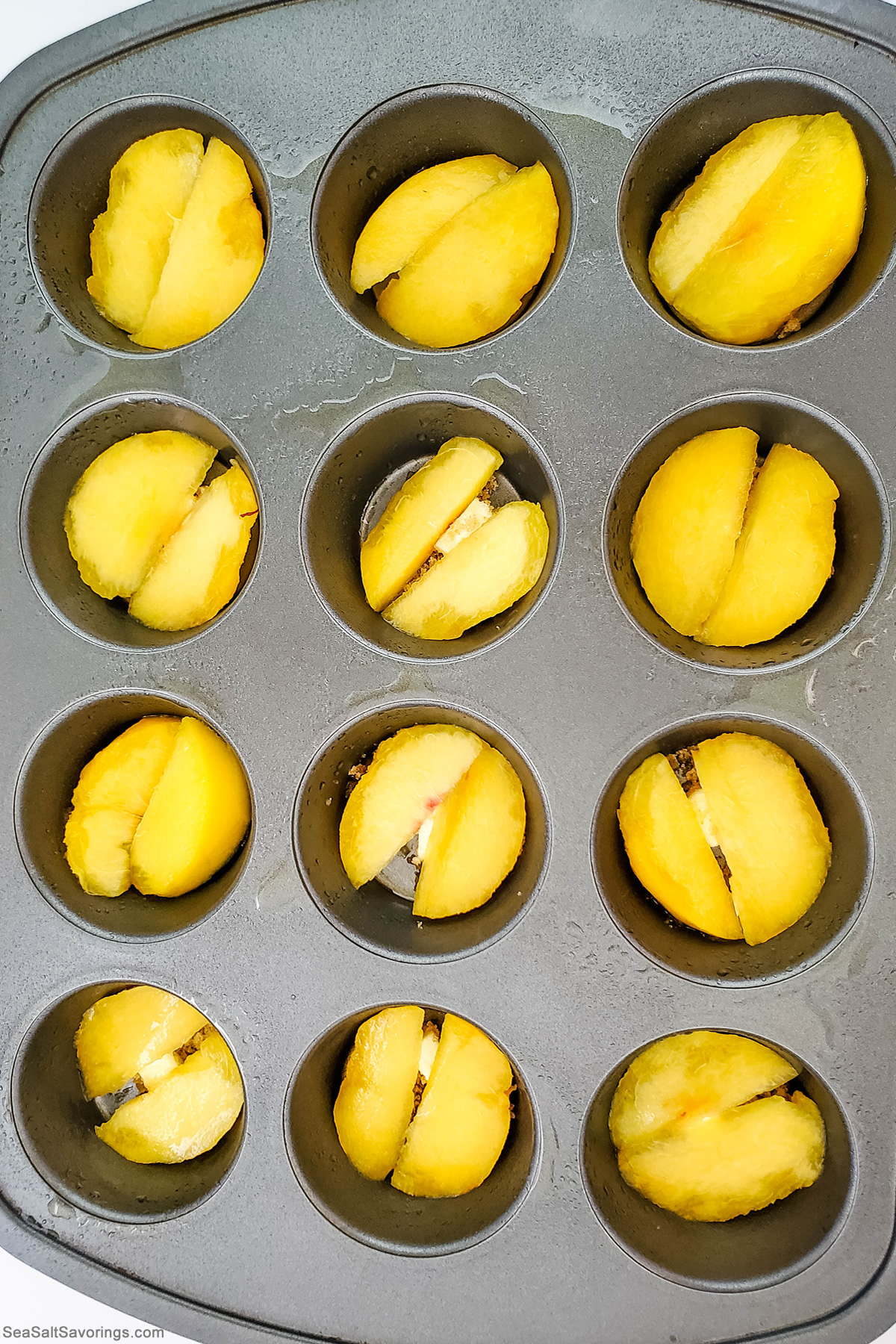 putting peaches in baking dish