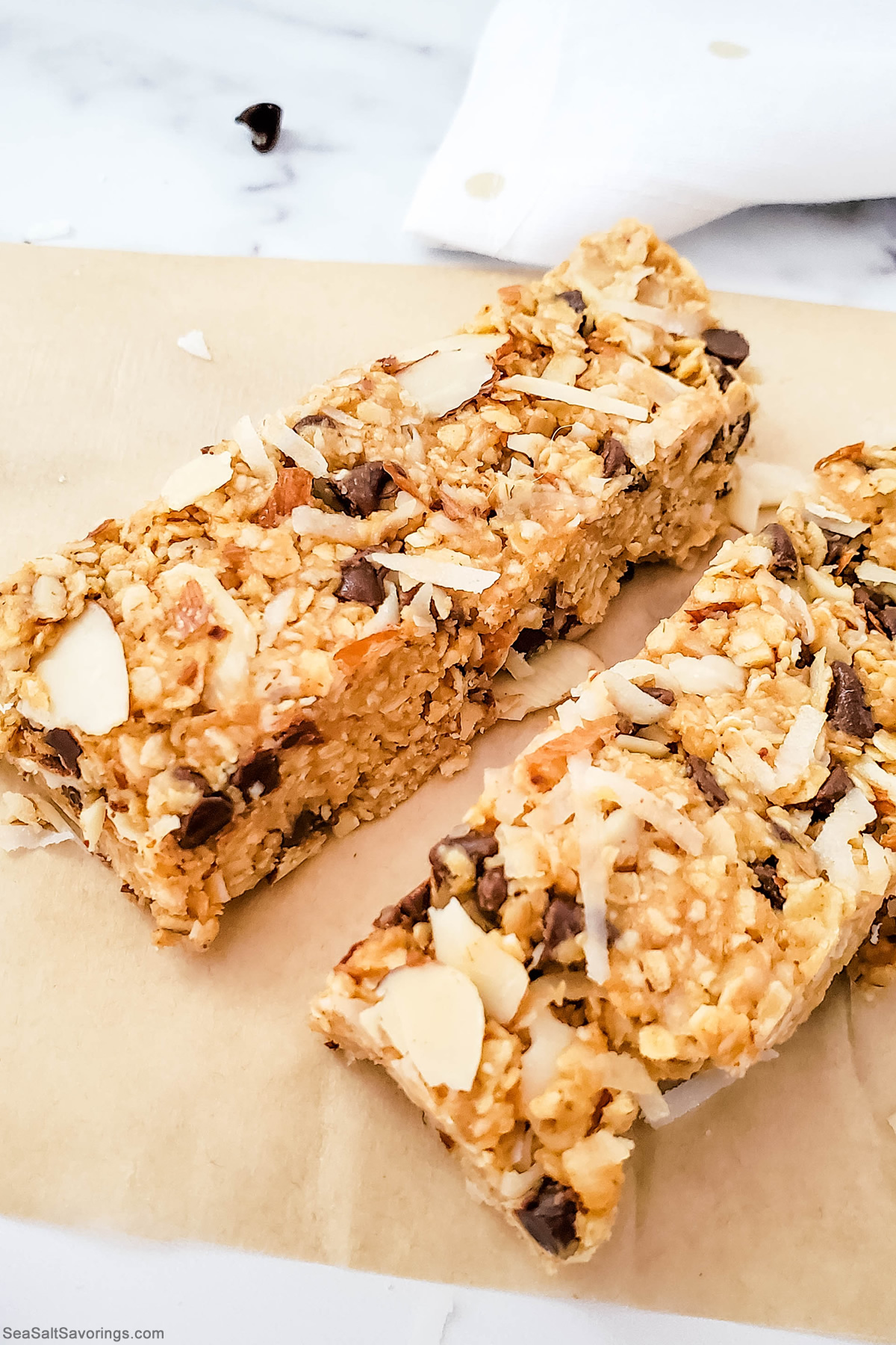 two fresh cut granola bars on a baking sheet