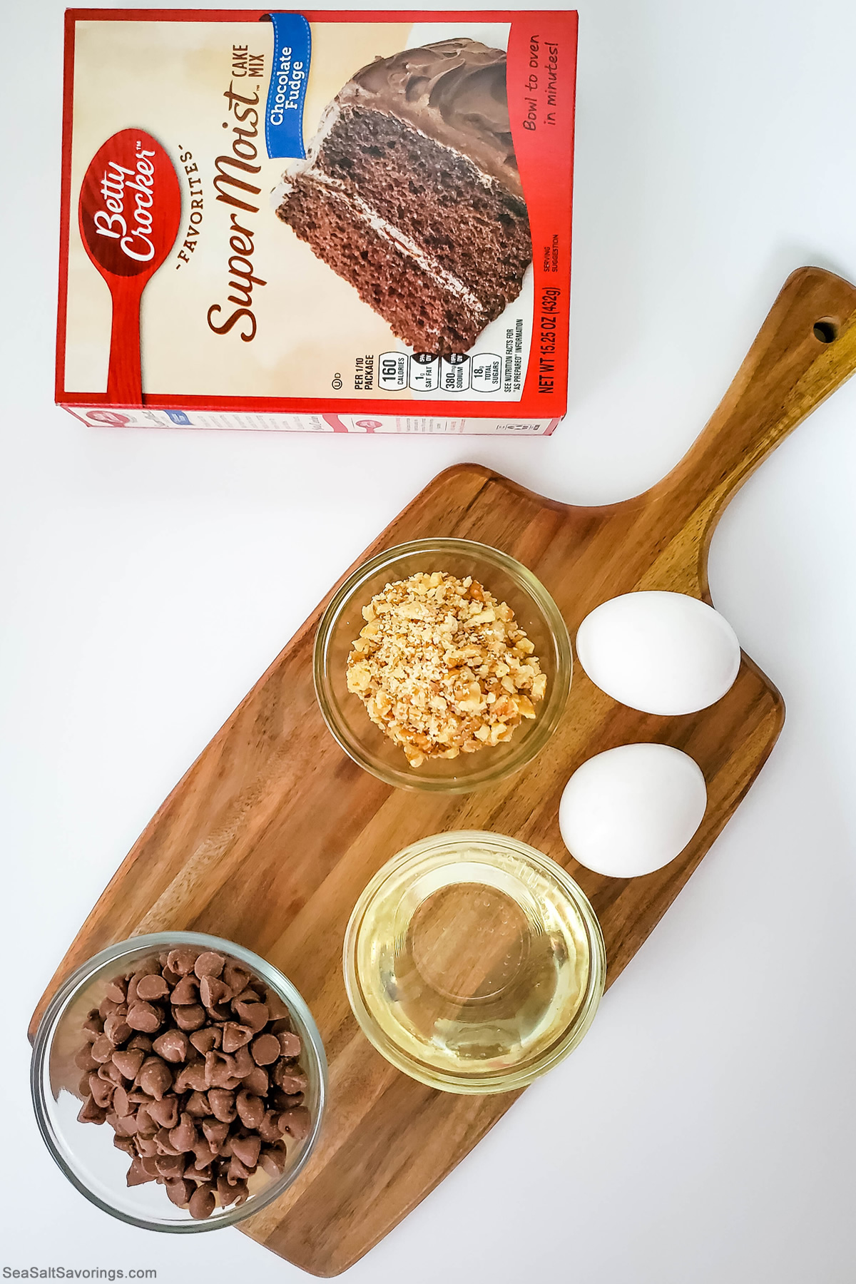 chocolate walnut cookie recipe ingredients including a box of cake mix