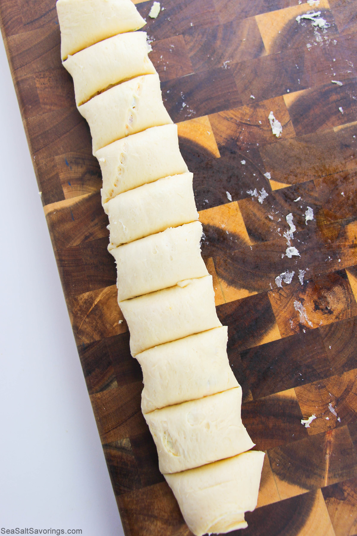 dough rolled into a log and then cut into sections