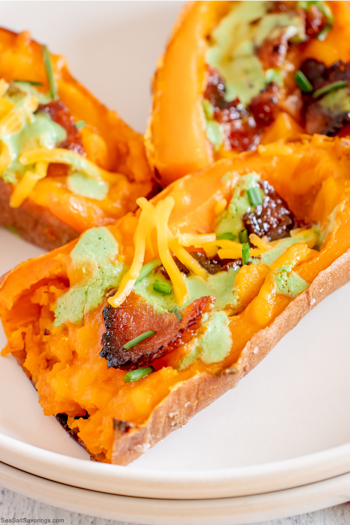 Loaded Sweet Potato Skins with Candied Bacon and a Spicy Basil Cream Sauce