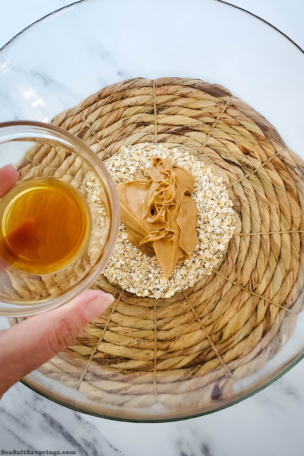 adding ingredients to a mixing bowl