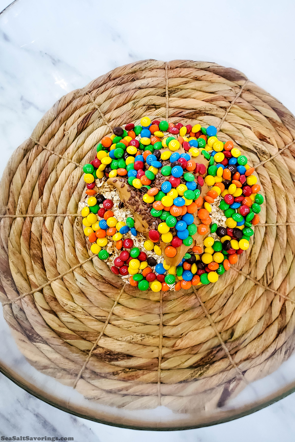 adding ingredients to a mixing bowl