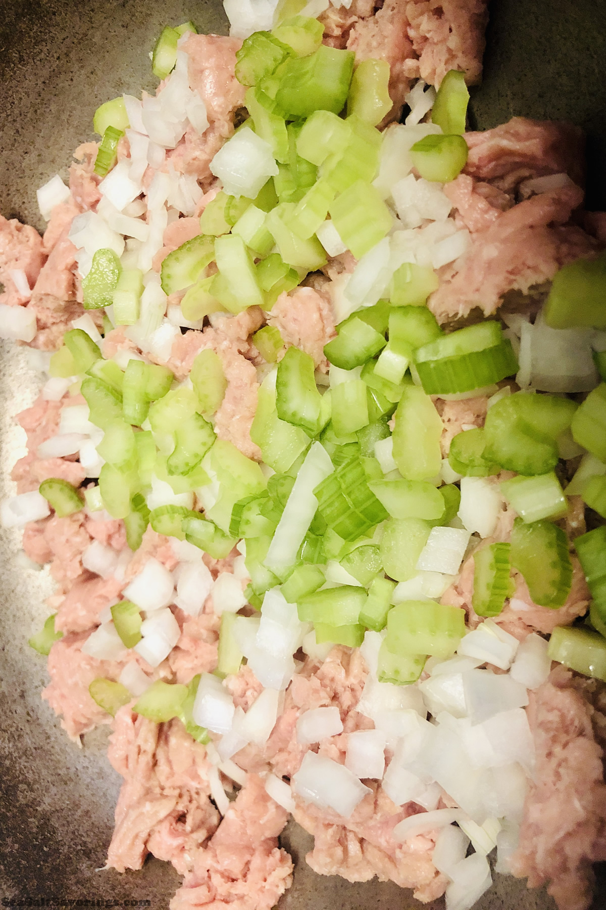 cooking ground beef and vegetables