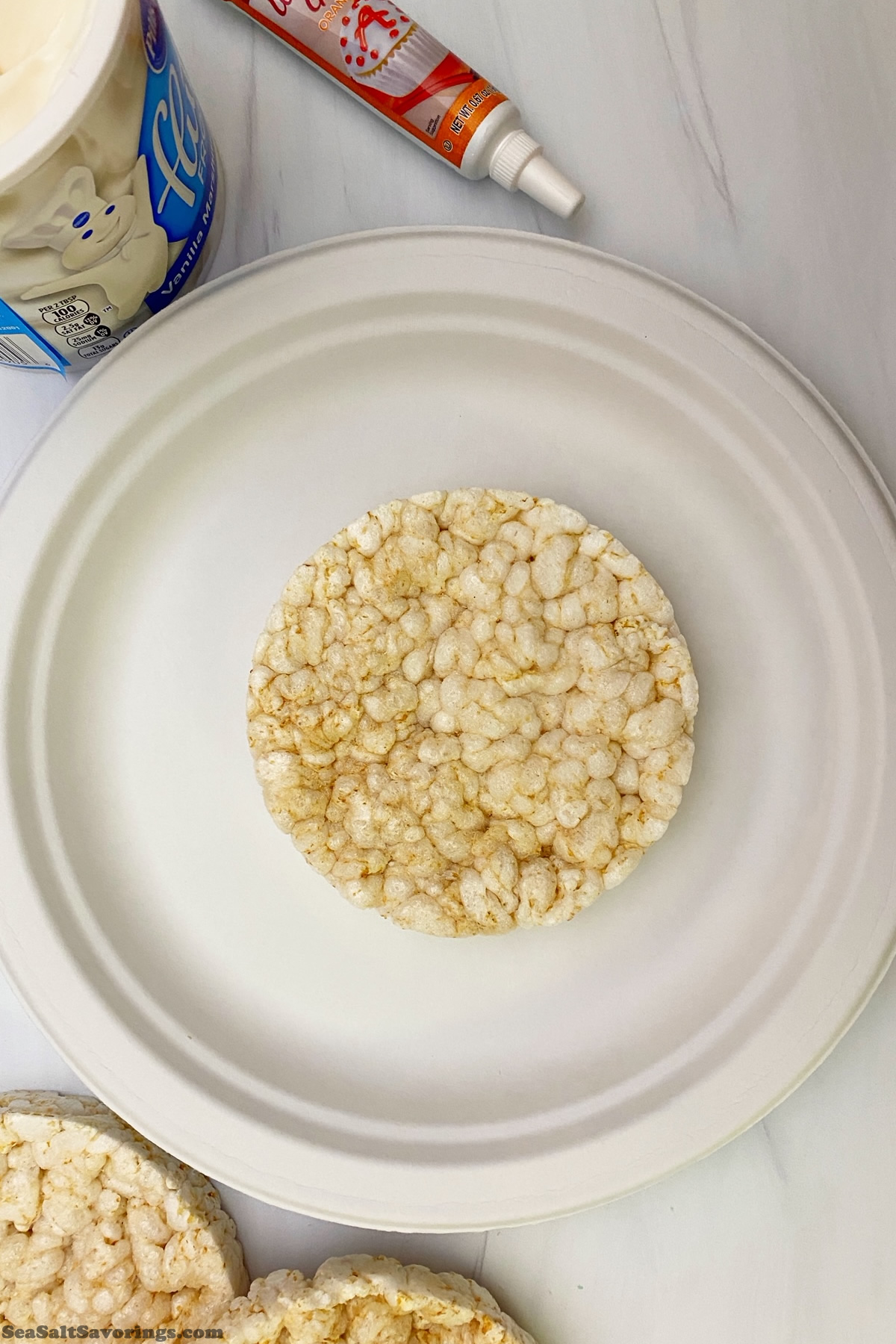 plain rice cake on a paper plate