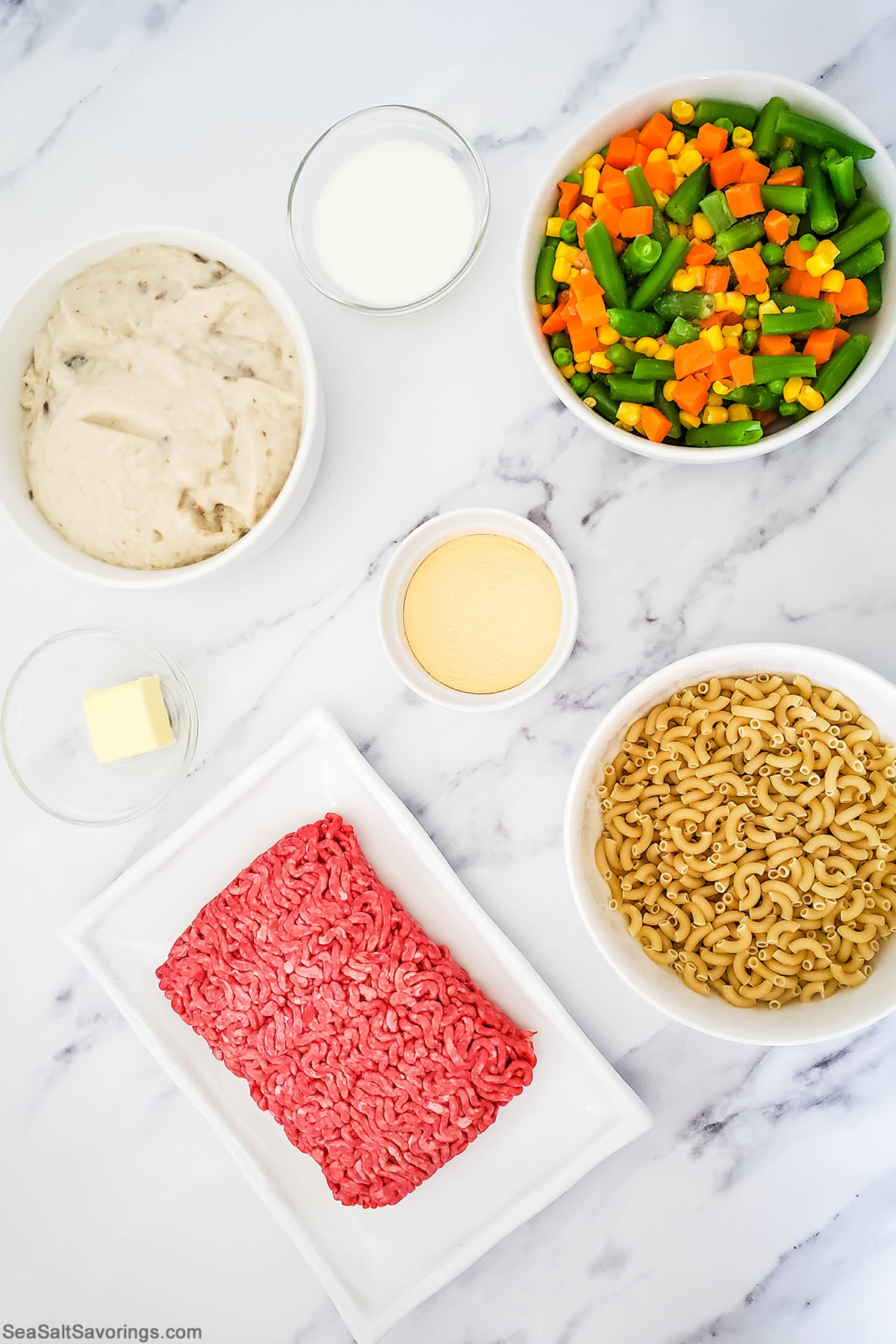 ingredients for mac and cheese shepherds pie on a table