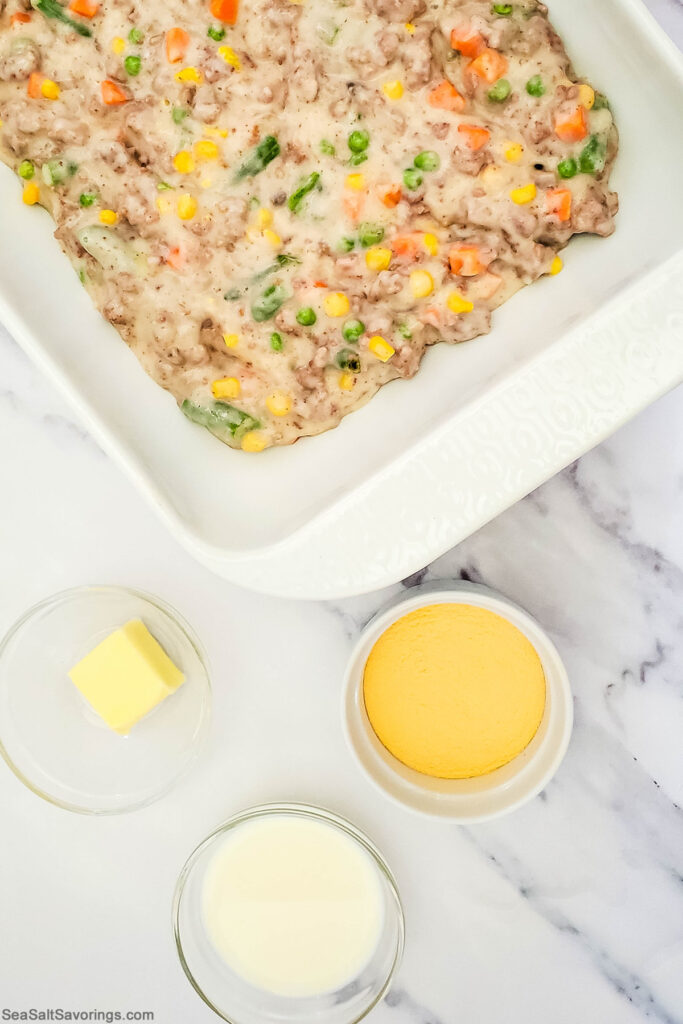 shepherds pie filling placed in baking dish