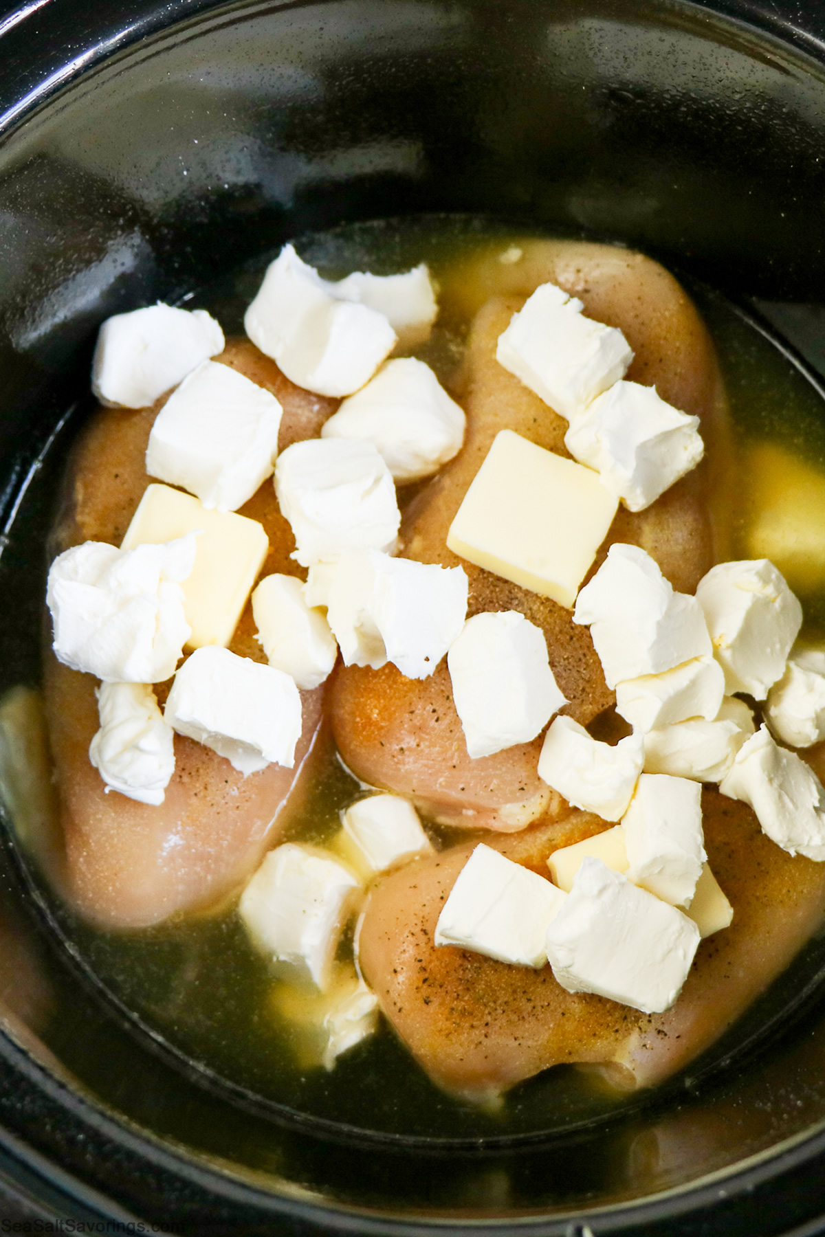 ingredients tossed into a slow cooker