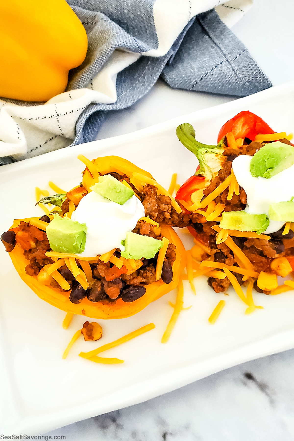 taco filling stuffed peppers on a plate