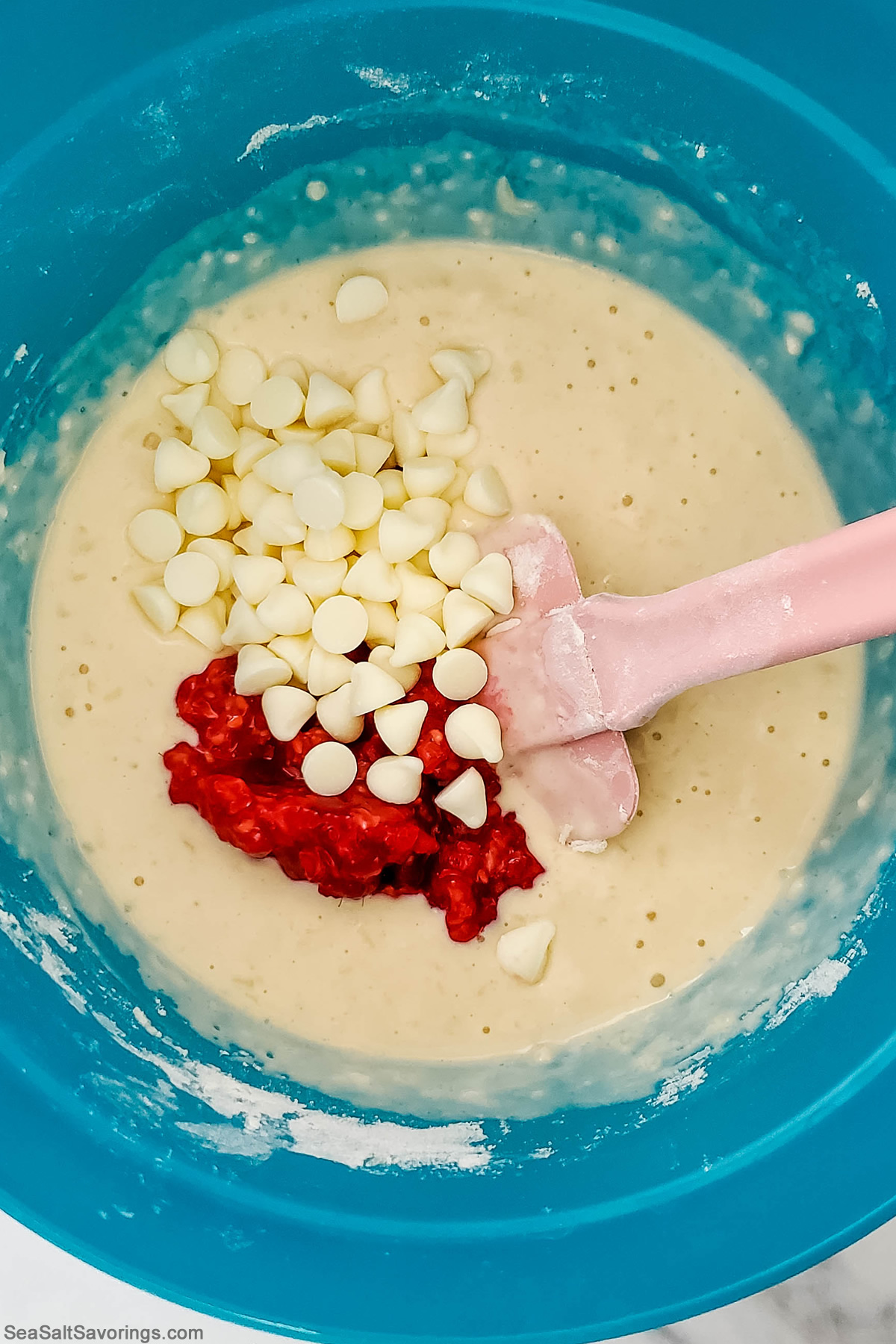 ingredients for white chocolate waffles in a mixing bowl