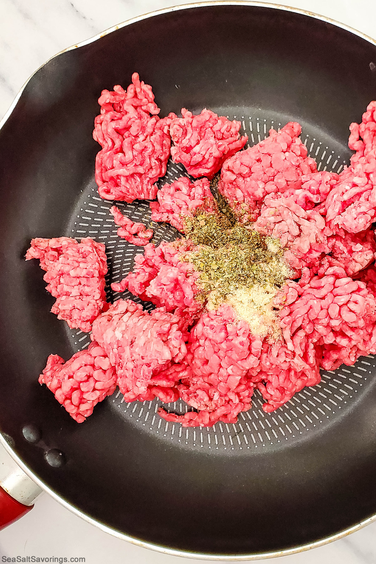 cooking ground beef in a skillet