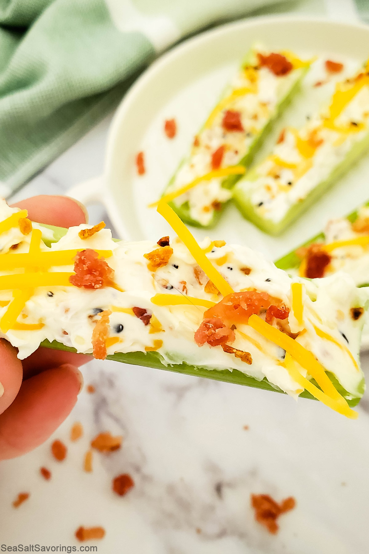 close up view of a stuffed celery stick