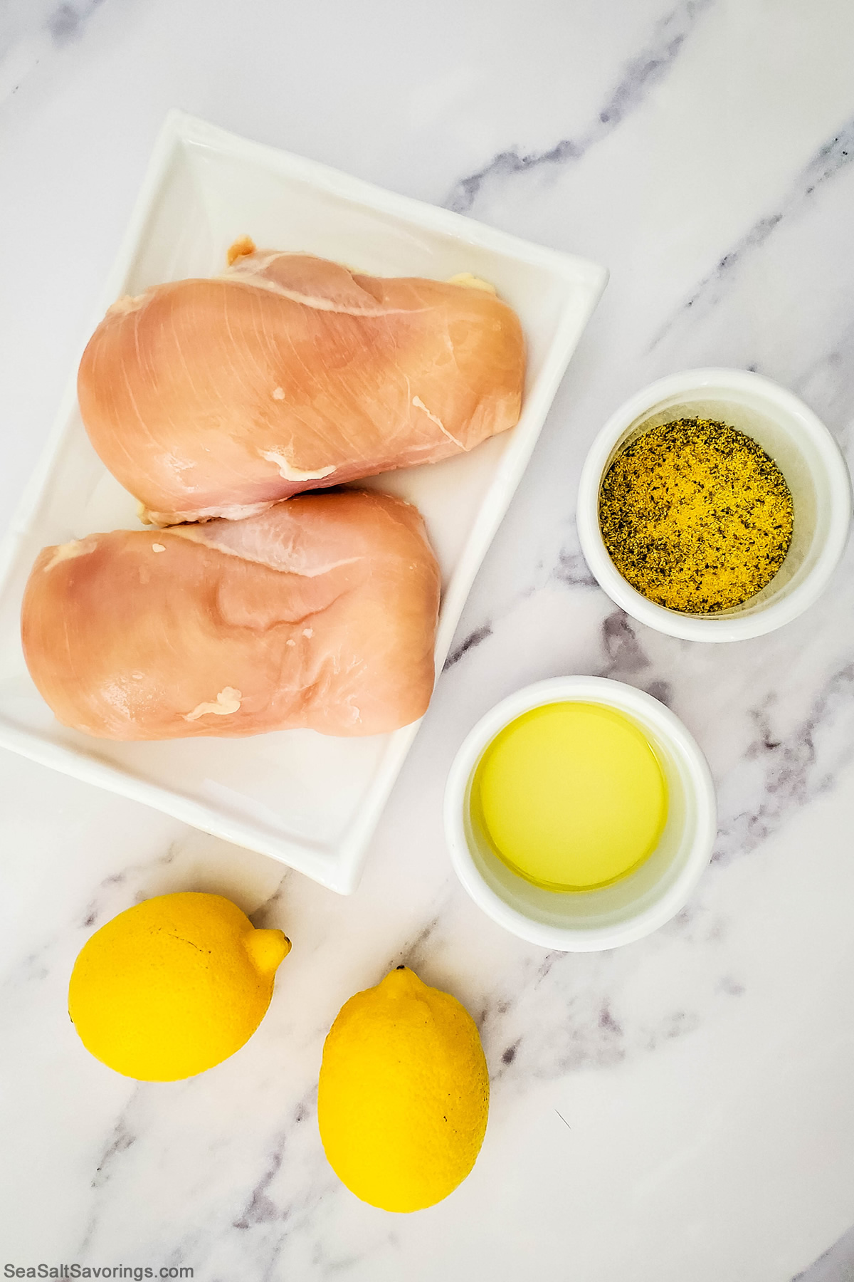 simple lemon pepper ingredients including seasoning and lemons and chicken