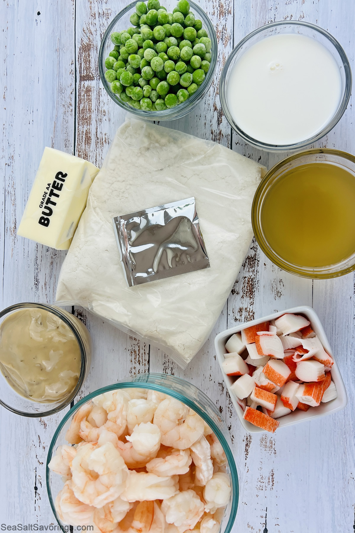 ingredients on a table for cheddar bay biscuit seafood bake