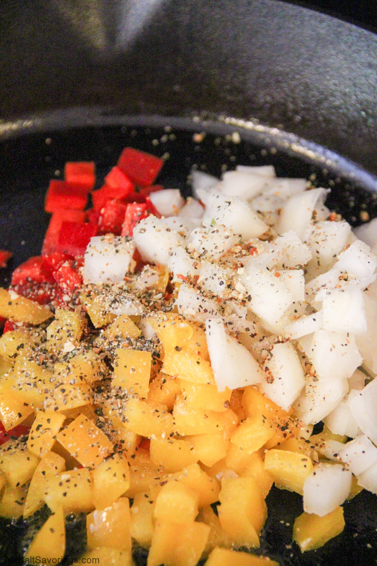 vegetables and seasoning frying in pan