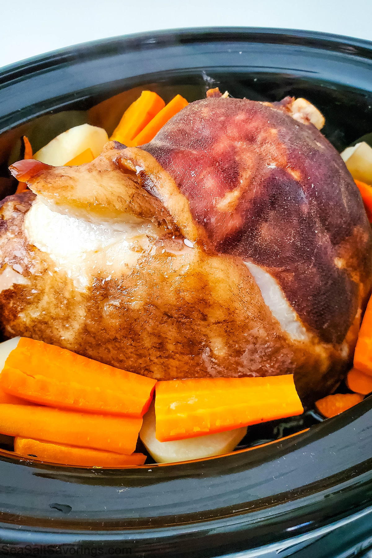 ham and vegetables cooking in a crock pot