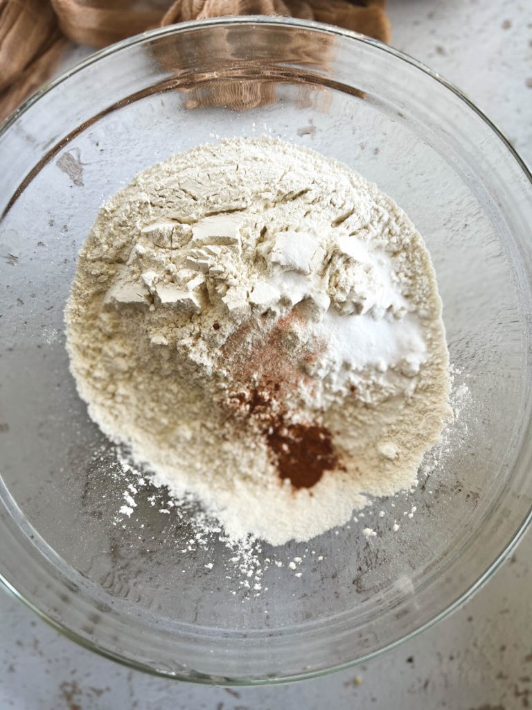 mixing dry ingredients in a glass bowl