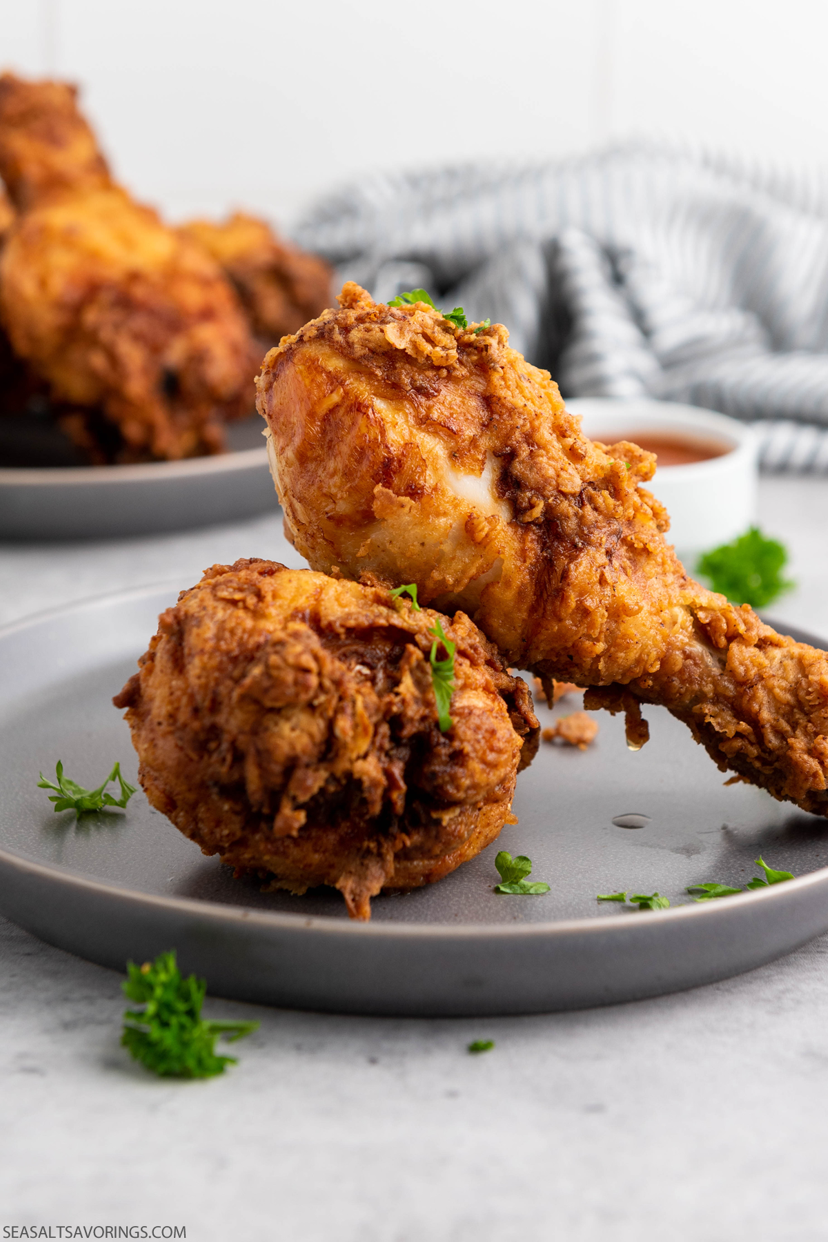 fried chicken legs on a plate