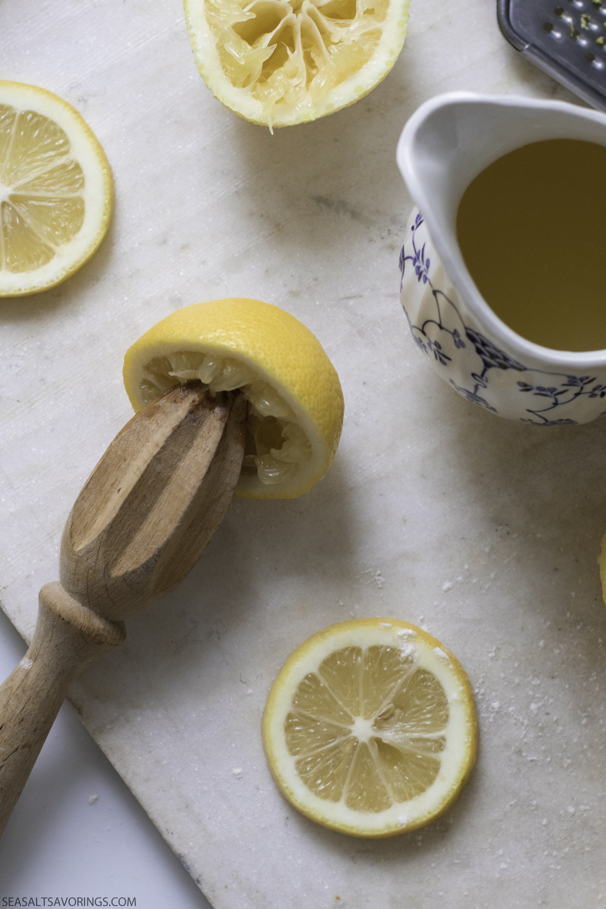 squeezing lemon juice out of a lemon