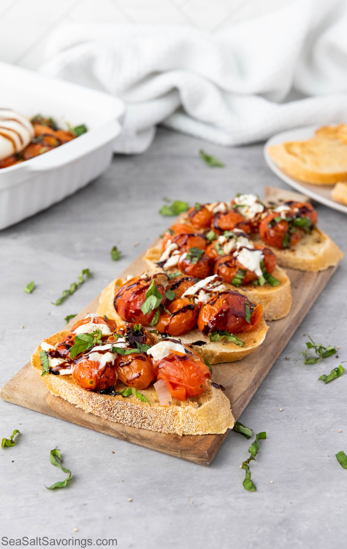 Bruschetta slices on a cutting board