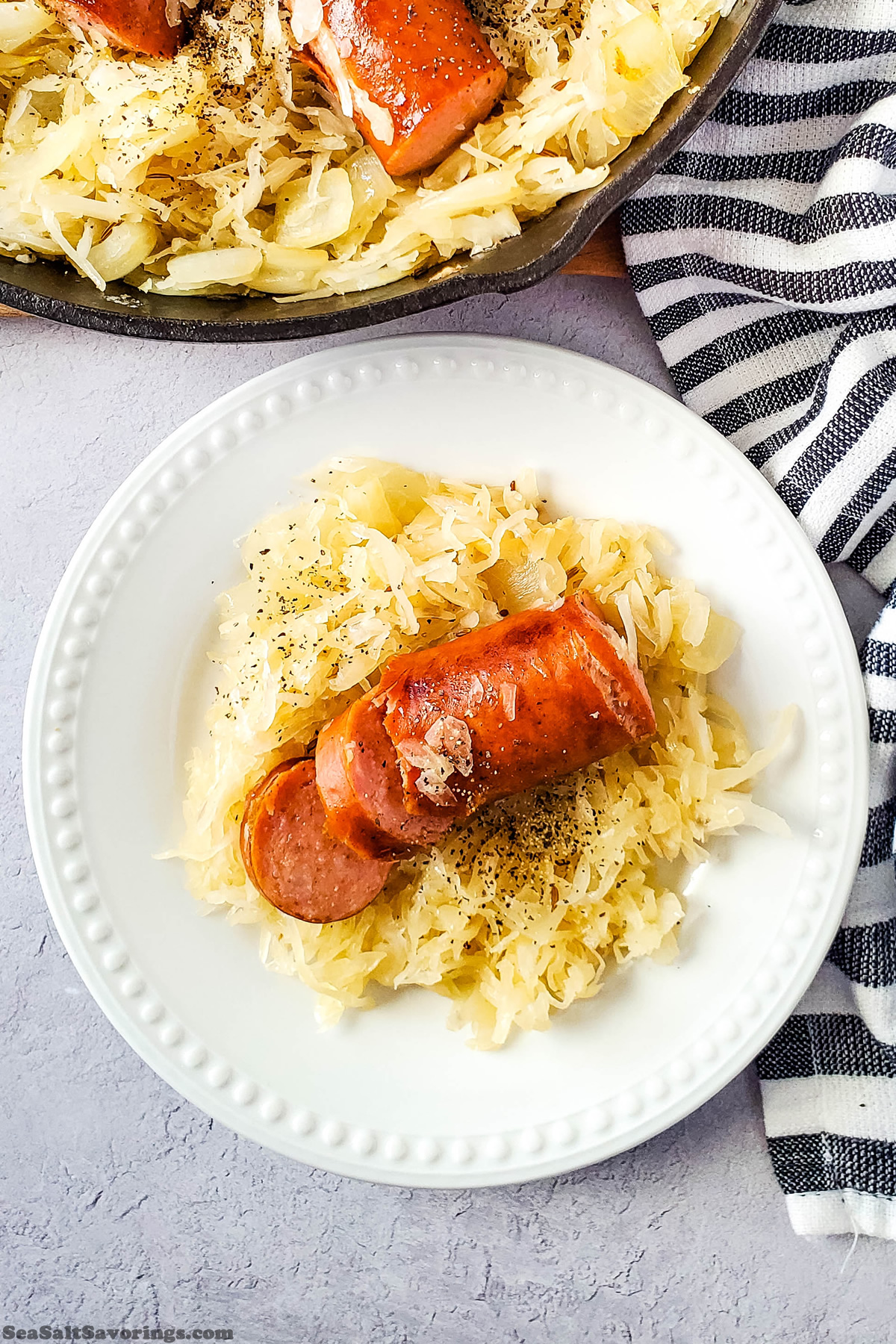 plate of kielbasa and sourkraut